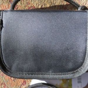 Sherpani Bags - Sherpani purple RFID crossbody small bag, nwt Sherpani Bags - Sherpani purple RFID crossbody small bag, nwt